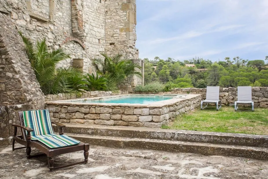 Raised stone swimming pool